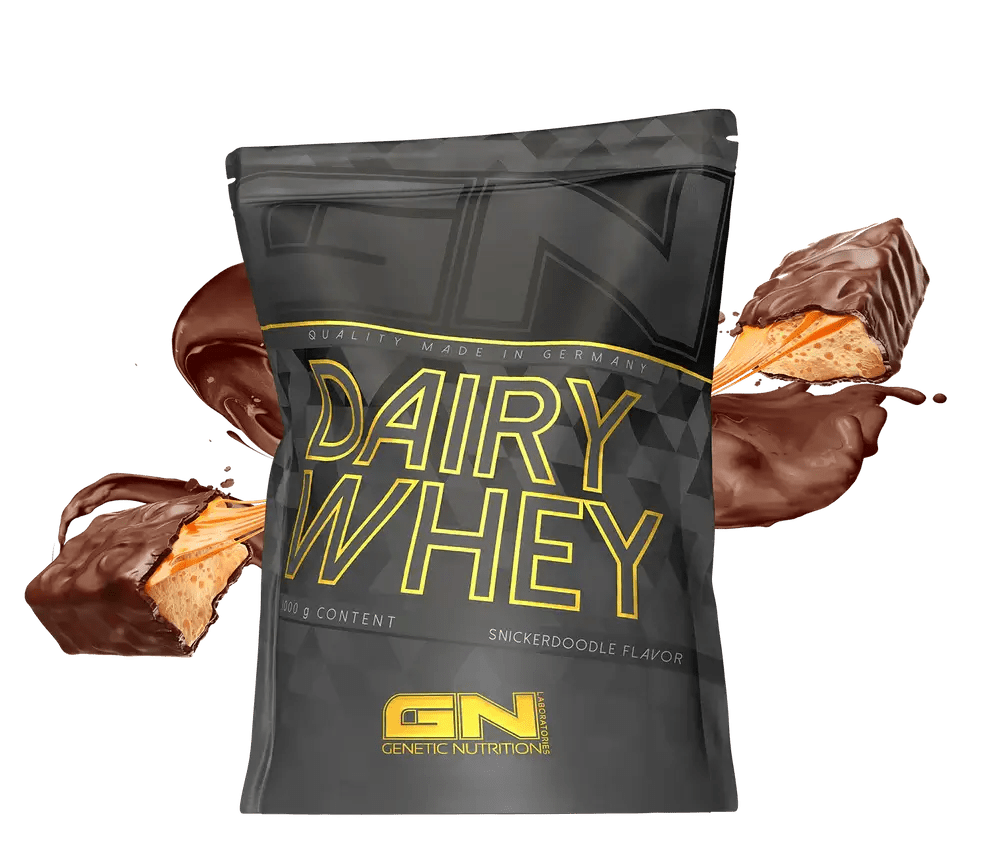 GN Dairy Whey isrugu baltymai protein powder packaging with Snickerdoodle flavor and chocolate syrup splashes.